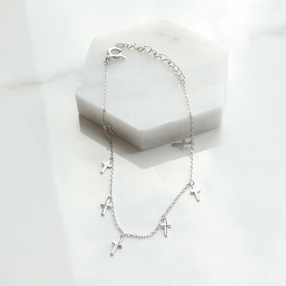 Cross drop bracelet